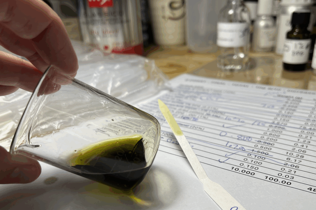 Green liquid in a glass.